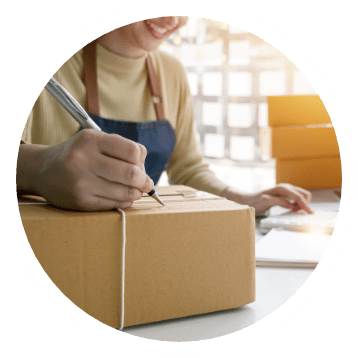 small business owner packaging a box